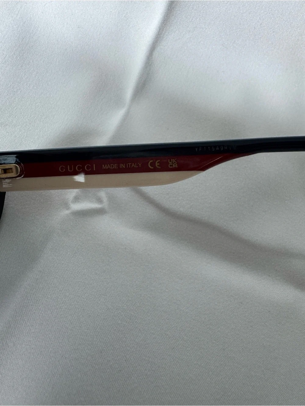 Gucci Black Oval Women's Sunglasses with Navy Temples